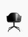 A front view of the Harbour Dining Chair with a black swivel star base, upholstered in black Dakar 0842 leather.