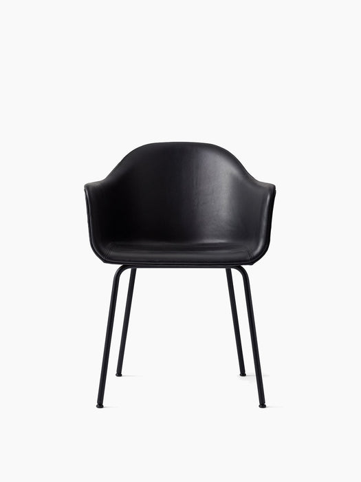 Front view of the Harbour Dining Chair, upholstered in black Dakar leather, with curved armrests and a black steel base.