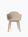 The Harbour Dining Chair, shown from the front, with off-white bouclé upholstery and a four-legged base in natural oak.