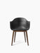 Front view of the Harbour Dining Chair with a black Dakar leather upholstered seat and a dark stained oak wooden base.