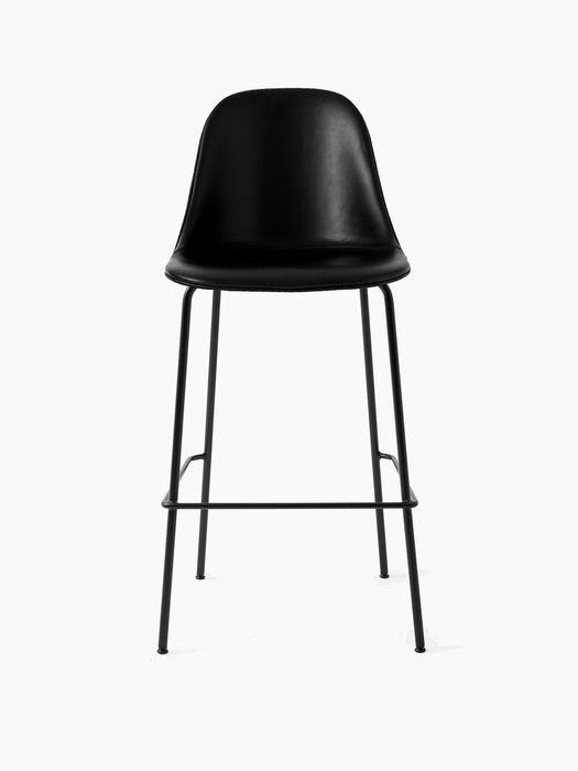 The upholstered Harbour Side Bar Chair in black Dakar leather, shown front-on with a high back and slender black steel frame.