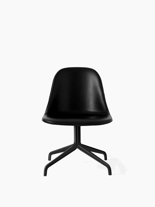 Front view of the Harbour Side Dining Chair, upholstered in black Dakar leather, with a matching black star swivel base.