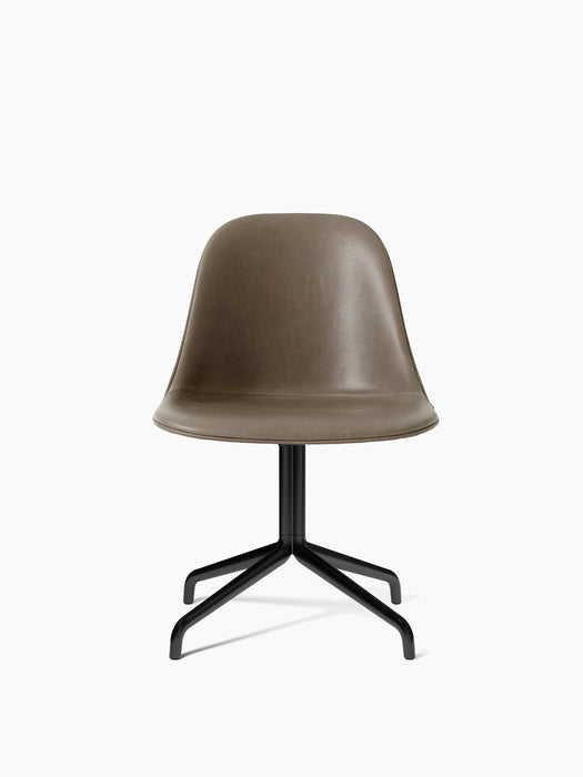 A front view of the Harbour Side Dining Chair upholstered in taupe Dakar leather, with a black, four-legged star swivel base.