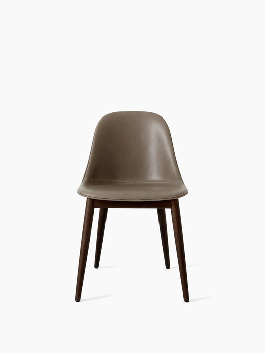 Front view of the Harbour Side Dining Chair, featuring a taupe Dakar leather seat on a dark-stained oak wood base.