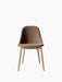 A front view of the Harbour Side Dining Chair, featuring a brown velvet upholstered shell on a natural oak wooden base.