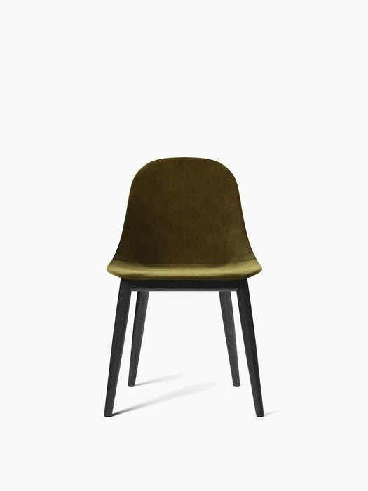 Front view of the Harbour Side Dining Chair with an olive green velvet upholstered shell and four black oak legs.