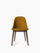 A front view of the Harbour Side Dining Chair, upholstered in mustard yellow Champion fabric with a dark stained oak base.