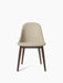 The Harbour Side Dining Chair with a light beige bouclé upholstered seat and a dark stained oak base, seen from the front.