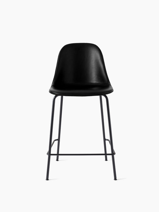 Harbour Side Counter Chair in black Dakar leather, viewed from the front, with a minimal black steel base and footrest.