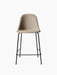 Front view of the upholstered Harbour Side Counter Chair with a light brown fabric seat and slender black steel base.