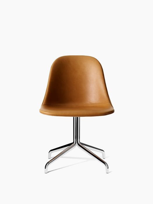 Front view of the Harbour Side Dining Chair with a light brown leather upholstered shell and a polished aluminium star base.