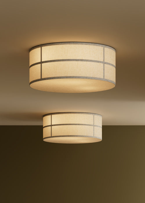 Two lit Hashira Ceiling Lamps with raw linen shades and dark steel frames flush-mounted on a cream ceiling above a dark wall