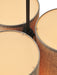 Close-up top view of the Hashira Pendant Lamp, Cluster, showing three illuminated cylindrical lampshades in raw linen.