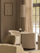 The Hashira Pendant Lamp hangs over a Nook Dining Table, surrounded by Tearoom Chairs, in a serene, neutral-toned room.