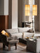 Living room with Offset Sofa, Brasilia Chair, Plinth table with Interconnect Holder, Torso lamp, and Hashira Pendants.