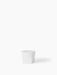 A small, sculptural Ignus Flameless Candle in matte white. Its square base transitions to a round top, on a white background.
