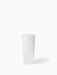 Front view of the Ignus Flameless Candle, a tall, sculptural white candle in matte bone china, on a white background.
