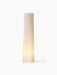 The tall, square-based Ignus Flameless Candle H35, lit from within, casting a soft, warm glow against a white background.