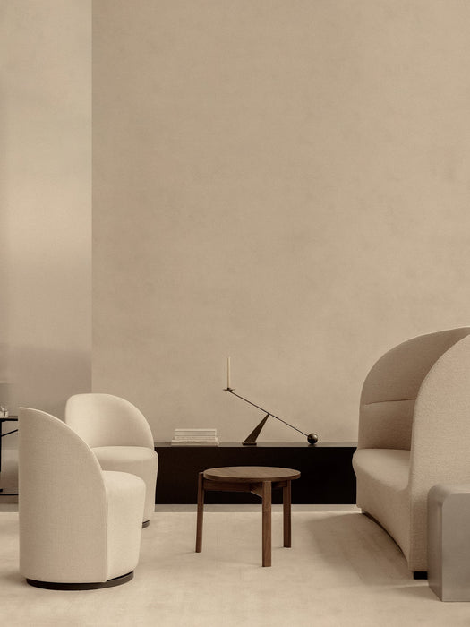 Beige room with Tearoom Sofa and Chairs, Passage Lounge Table, Volume Side Table, and black Interconnect Candle Holder.