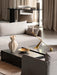 A living room featuring an Offset Loose Cover sofa, a Plinth table with an Interconnect Candle Holder, and a Brasilia chair.