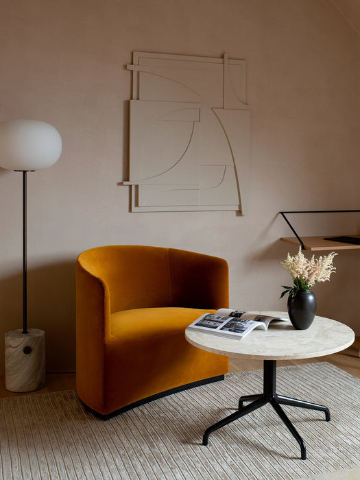 A JWDA Floor Lamp with a marble base stands in a stylish room next to a yellow velvet armchair and a round side table.