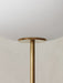 A detailed close-up of the JWDA Floor Lamp, showing the smooth white opal glass shade meeting the slender brushed brass stem.