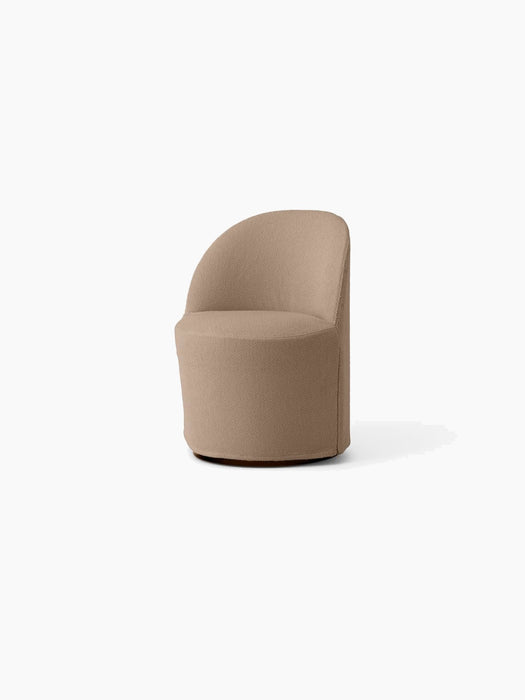 Angled view of the Tearoom Club Chair on a swivel base, fitted with the textured, light brown Logan Flint loose cover.