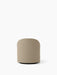 Back view of the Tearoom Lounge Chair with Swivel, upholstered in a sandy-beige Logan Sand loose cover on a black base.
