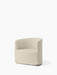 Angled view of the Tearoom Lounge Chair upholstered in textured, light beige Logan Jasmin fabric against a white background.