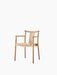 The Merkur Dining Chair with Armrests in natural oak, shown from a three-quarter angle on a white background.