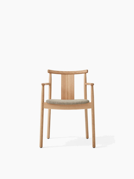 Front view of the Merkur Dining Chair with Armrests in natural oak with a grey Hallingdal fabric upholstered seat.