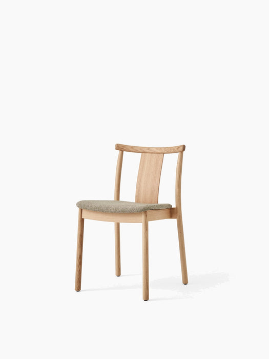 The Merkur Dining Chair in natural oak with a grey Hallingdal 200 upholstered seat, shown at an angle on a white background.