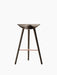 Front view of the ML 42 Bar Stool. It has a smoked oak frame, a moulded seat, three legs, and a copper footrest.