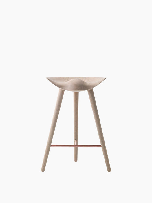 Front view of the ML 42 Counter Stool in light oak, featuring a sculptural seat, three legs, and a copper footrest.