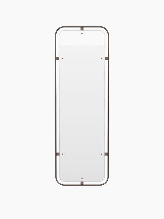 A front-on view of the Nimbus Mirror, Rectangular. The full-length mirror has rounded corners and a slim bronzed brass frame.