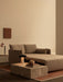Beige Offset Sofa Bed on a Duomo Rug, partially extended, with a marble Plinth Low table and Reverse Lamp.