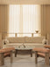Beige living room with Offset Sofa, Lounge Table, Interconnect Candle Holder, and Brasilia Lounge Chairs.