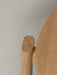 A detailed close-up of the Passage Stool in natural oak, showing the fine craftsmanship and wood grain of the joinery.