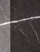A close-up of the join between a grey marble and a dark charcoal marble slab, showing material options for the Plinth Low.