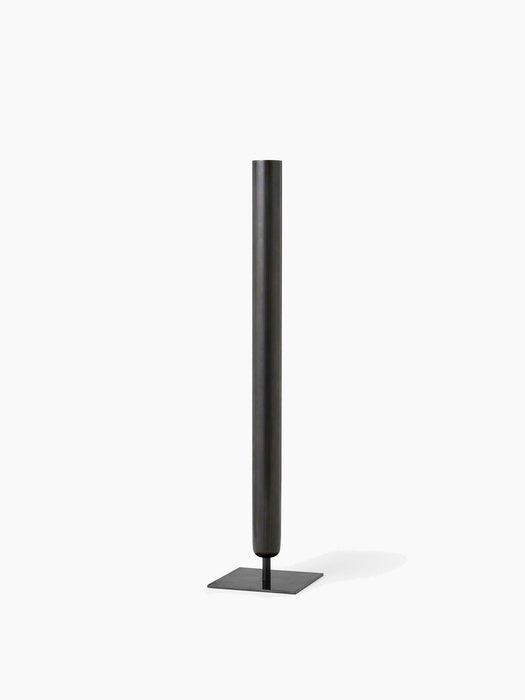Audo Copenhagen Stance Vase H50 in bronzed brass. A tall, slender cylindrical vase with a dark finish on a flat square base.