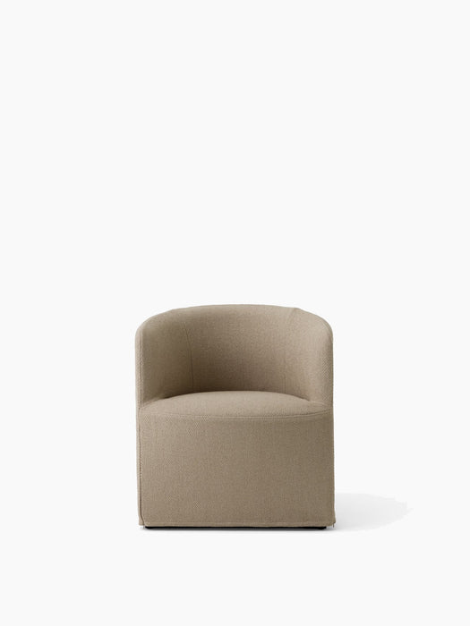 Front view of the Tearoom Club Chair with a loose cover in sand-coloured Logan fabric, isolated on a white background.