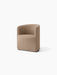 Angled view of the Tearoom Club Chair upholstered in a textured, light brown Logan Flint fabric, shown on a white background.