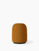 Back view of the Tearoom Club Chair, Swivel w/ Return, upholstered in mustard Champion 041 fabric on a black swivel base.
