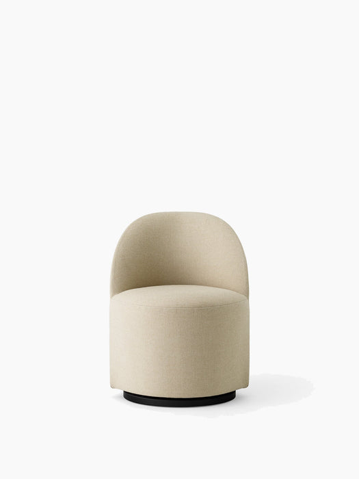 A front-on view of the Tearoom Club Chair, Swivel w/ Return, upholstered in a light beige Hallingdal fabric on a black base.