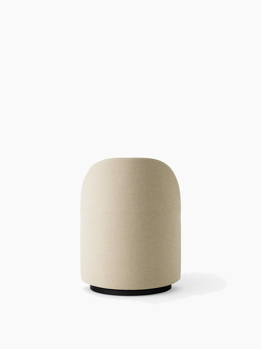 Back view of Tearoom Club Chair, Swivel w/ Return, upholstered in light beige Hallingdal 65 fabric on a black swivel base.