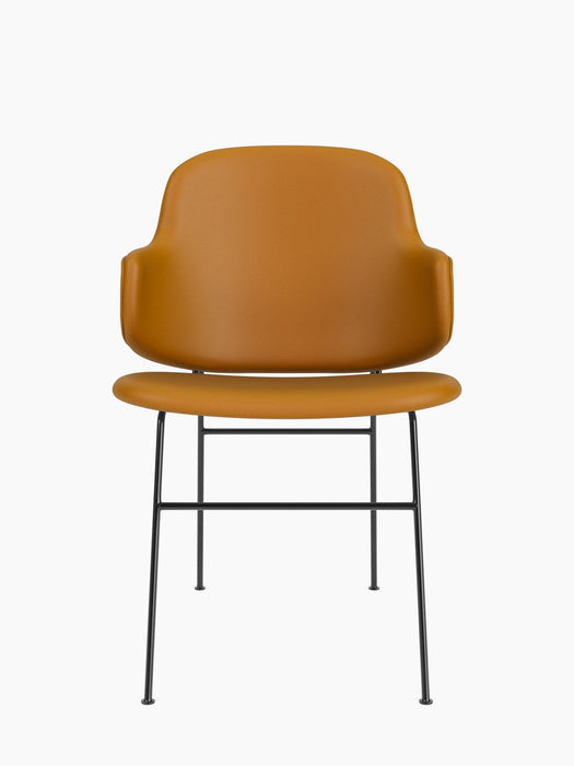 A front view of The Penguin Dining Chair, fully upholstered in tan Dakar 0250 leather, with a slender black steel frame.
