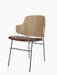 Angled view of The Penguin Dining Chair with a natural oak back, brown leather seat, and a slender black steel frame.