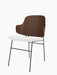 Angled view of The Penguin Dining Chair with a walnut veneer back, light grey Hallingdal fabric seat, and black steel frame.