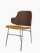 The Penguin Dining Chair with a walnut backrest, mustard yellow Dakar 0250 upholstered seat, and black steel frame.