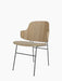 The Penguin Dining Chair shown at an angle, with a light oak back, beige upholstered seat, and a slender black steel frame.